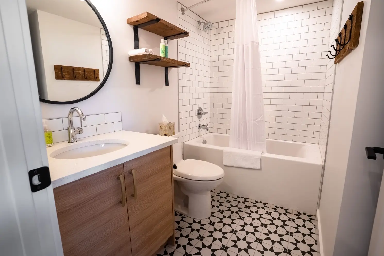 Modern bathroom in Basecamp Suites Canmore one-bedroom suite with tiled shower.