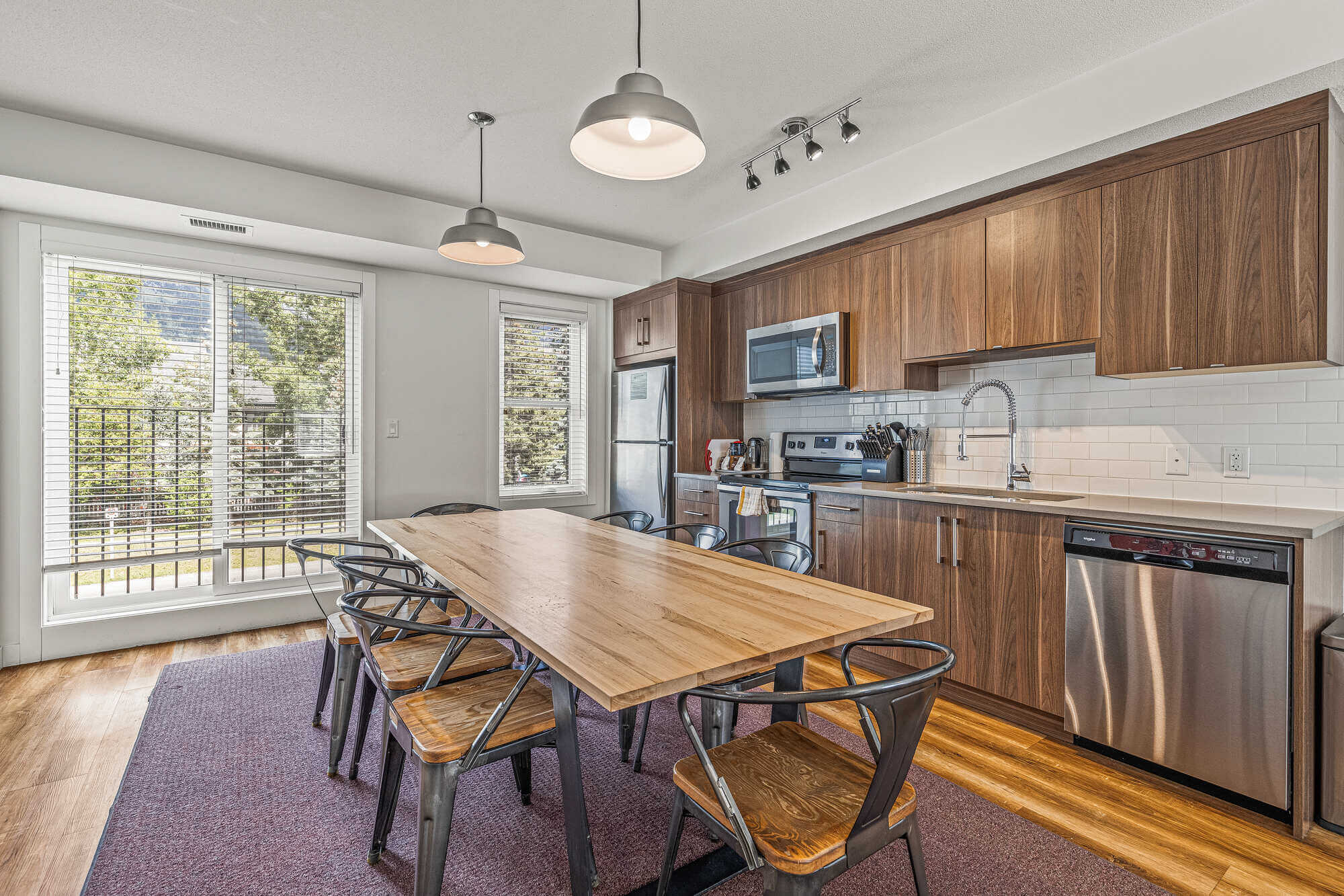 Basecamp Resorts Canmore five-bedroom suite dining area and kitchen
