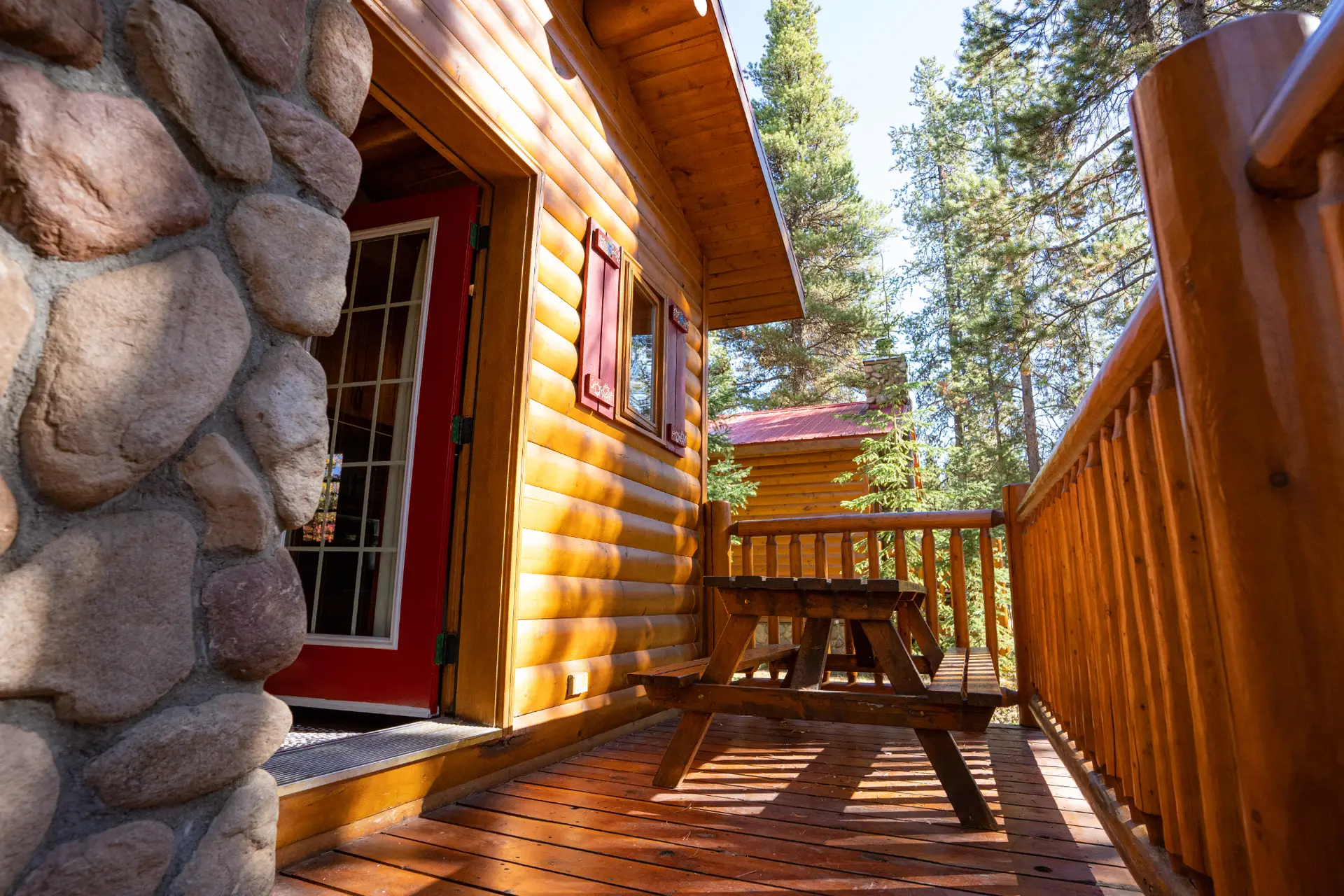 Basecamp Baker Creek family cabin deck with picnic table
