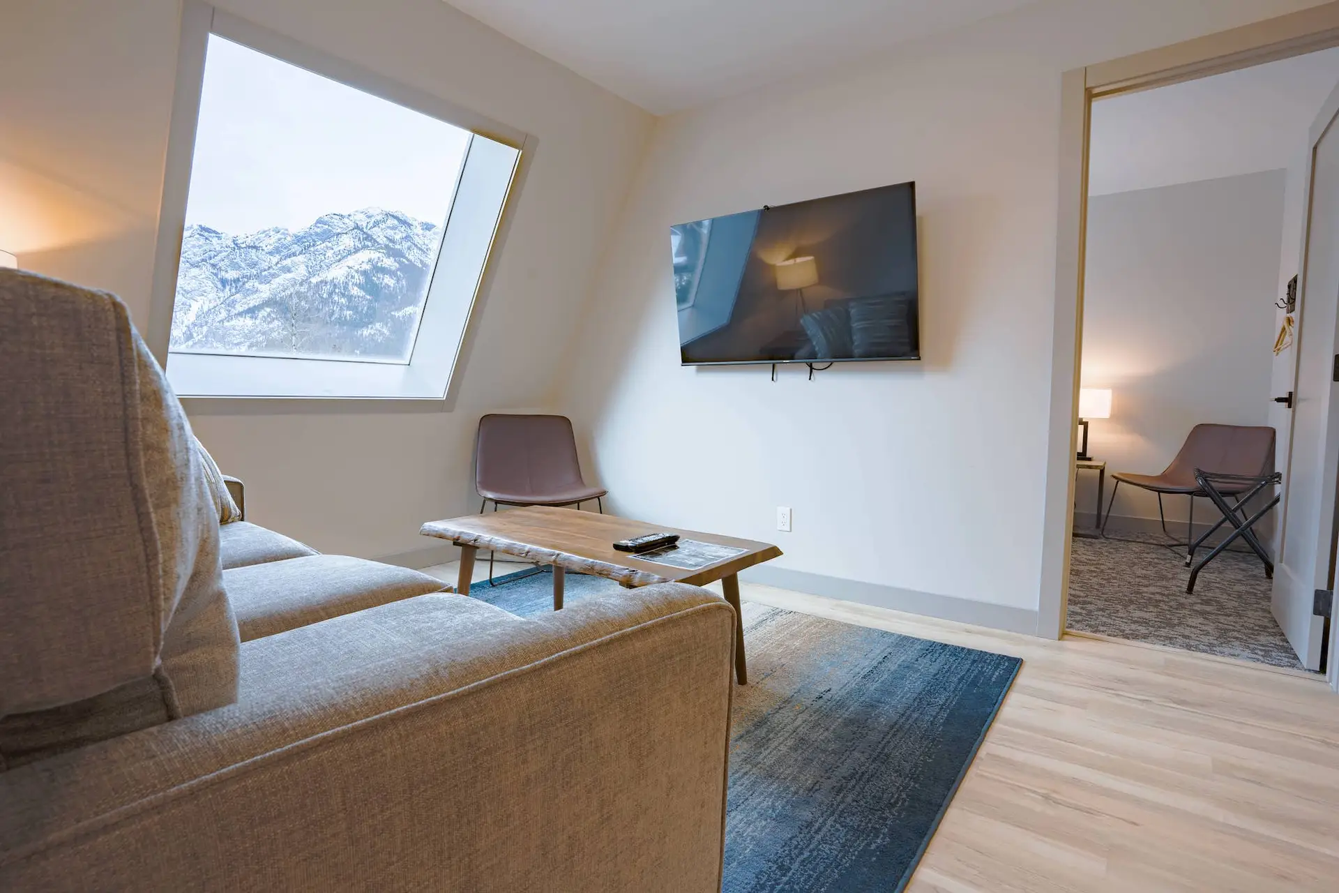 Basecamp Suites Banff Superior Two King Suite living area with mountain view