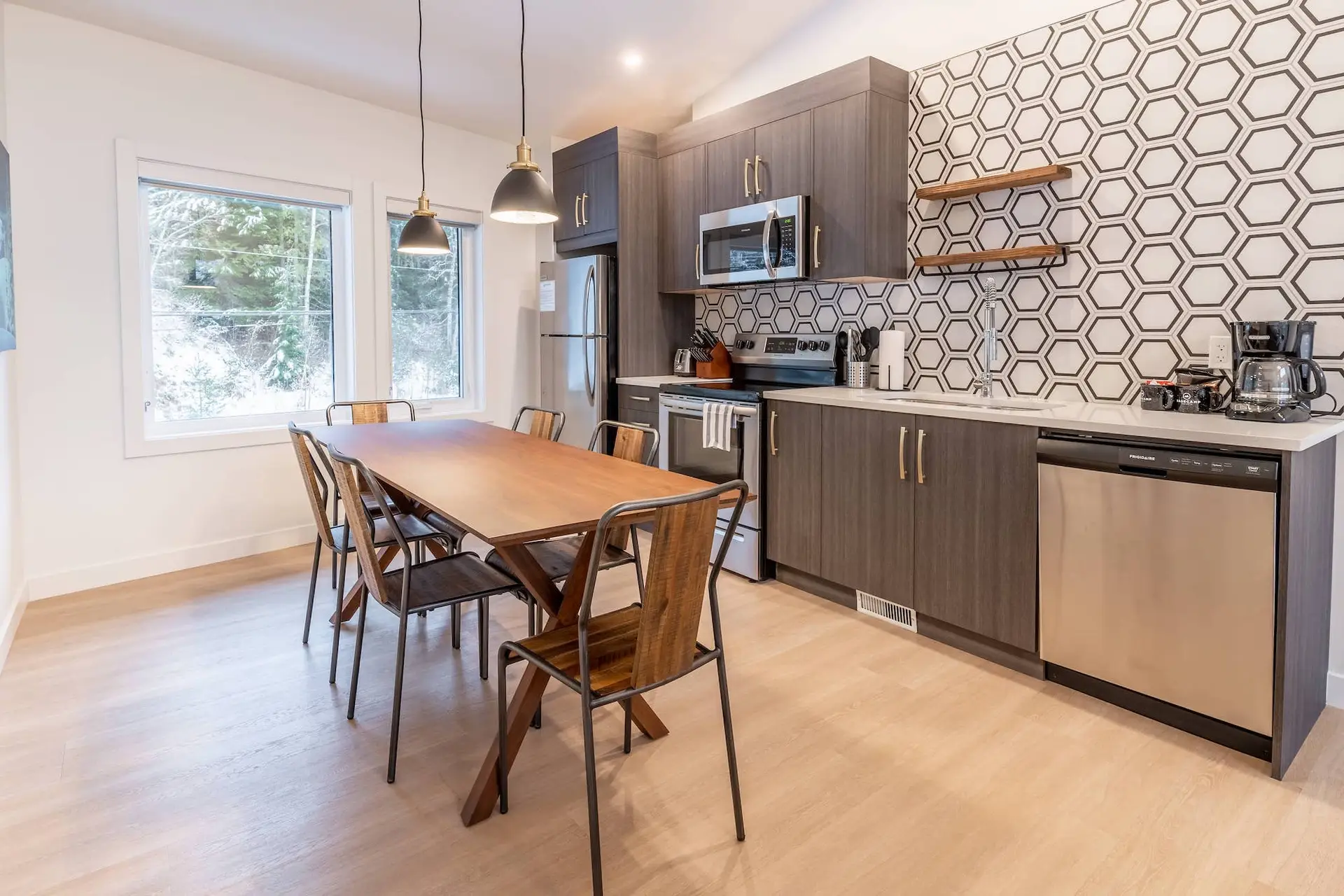 Revelstoke four bedroom suite dining and kitchen area with modern decor